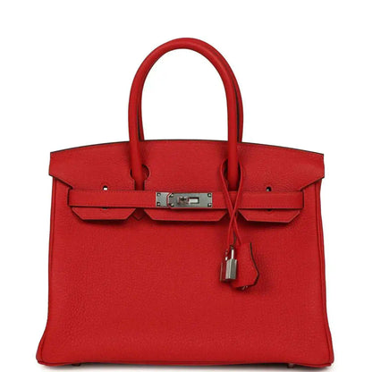 Red Togo leather Birkin 30 bag with two top handles, front clasp lock, palladium hardware.