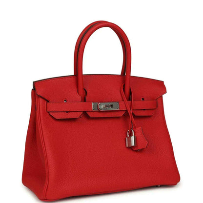 Red Togo leather Birkin 30 bag with two top handles and front clasp lock, palladium hardware.