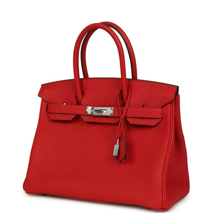 Red Togo leather Birkin 30 bag front view with two top handles and front clasp lock.