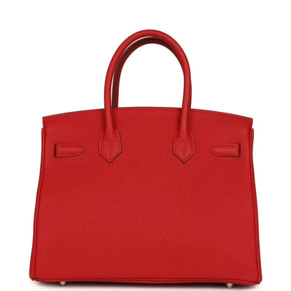 Red Togo leather Birkin 30 bag back view with two top handles and embossed leather details.