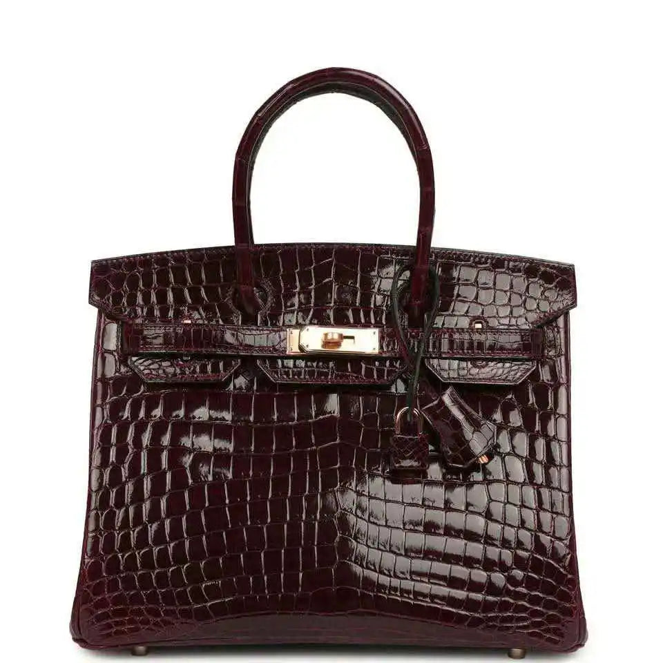 Hermes Birkin 30 bag, bordeaux glossy crocodile leather, gold-tone clasp and handles