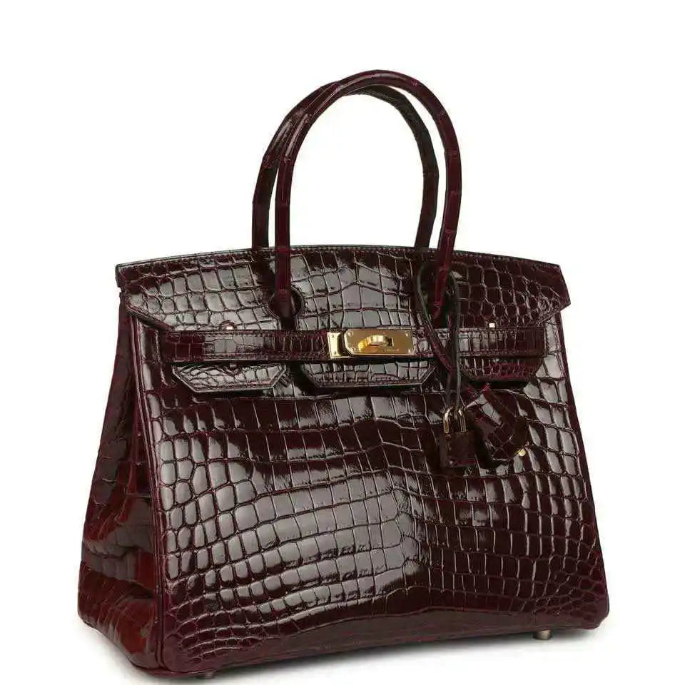 Hermes Birkin 30 bag, bordeaux glossy crocodile leather, front flap with gold-tone clasp