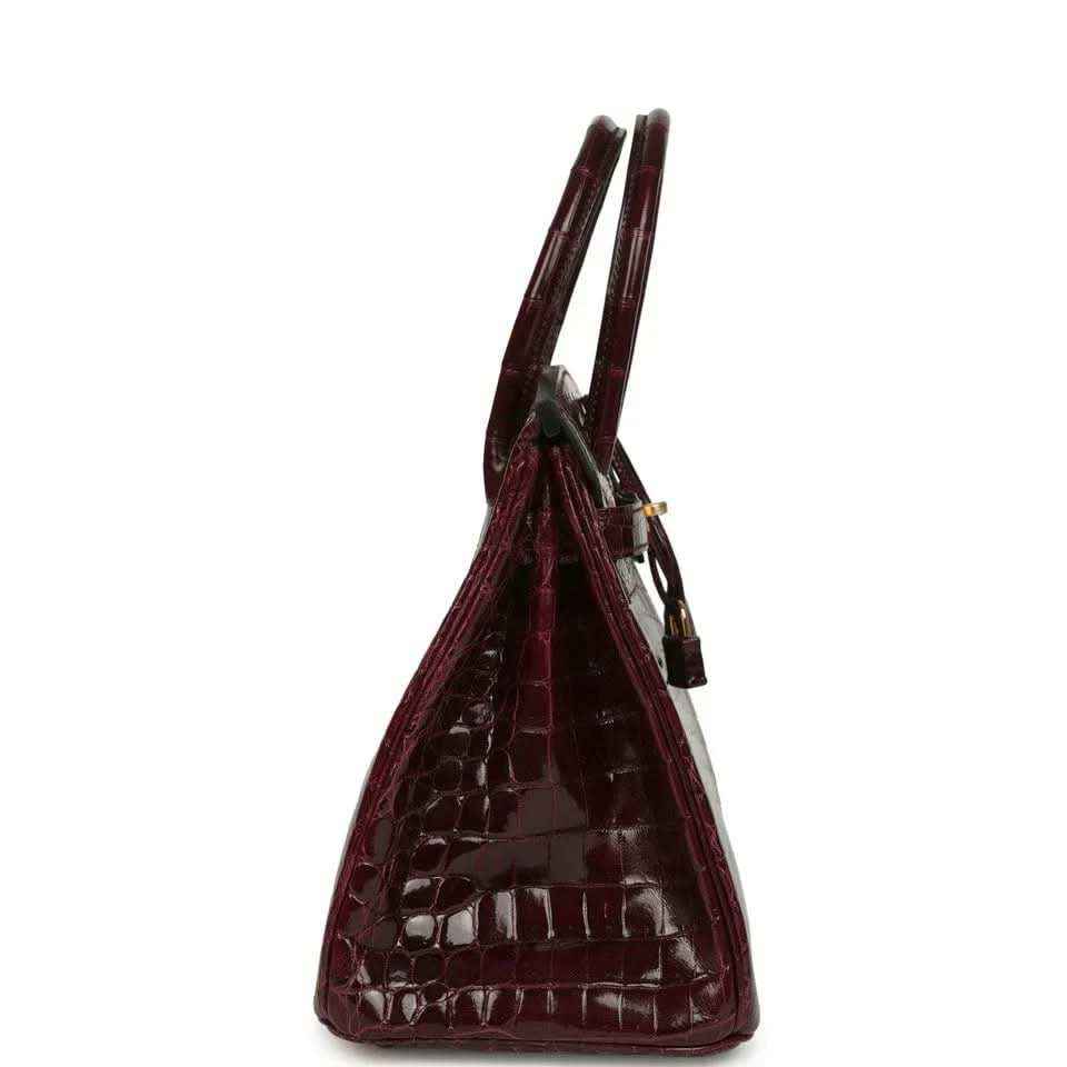 Hermes Birkin 30 bag side view, bordeaux glossy crocodile leather with gold-tone hardware
