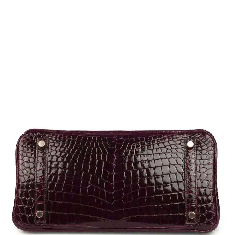 Hermes Birkin 30 bag underside view, bordeaux crocodile leather with metal snap studs