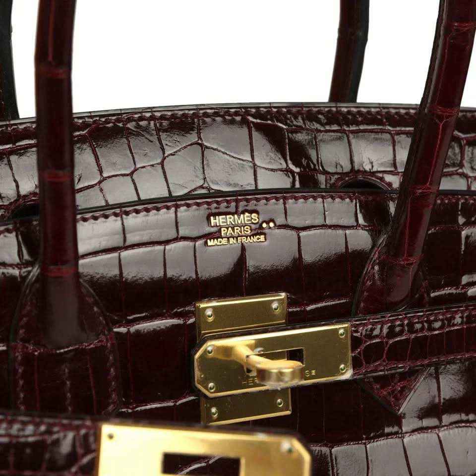 Hermes Birkin 30 bag interior, Hermes stamp and gold-tone lock hardware on croc lining