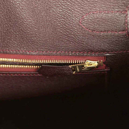 Hermes Birkin 30 bag interior pocket, gold-tone zipper and dark bordeaux leather trim