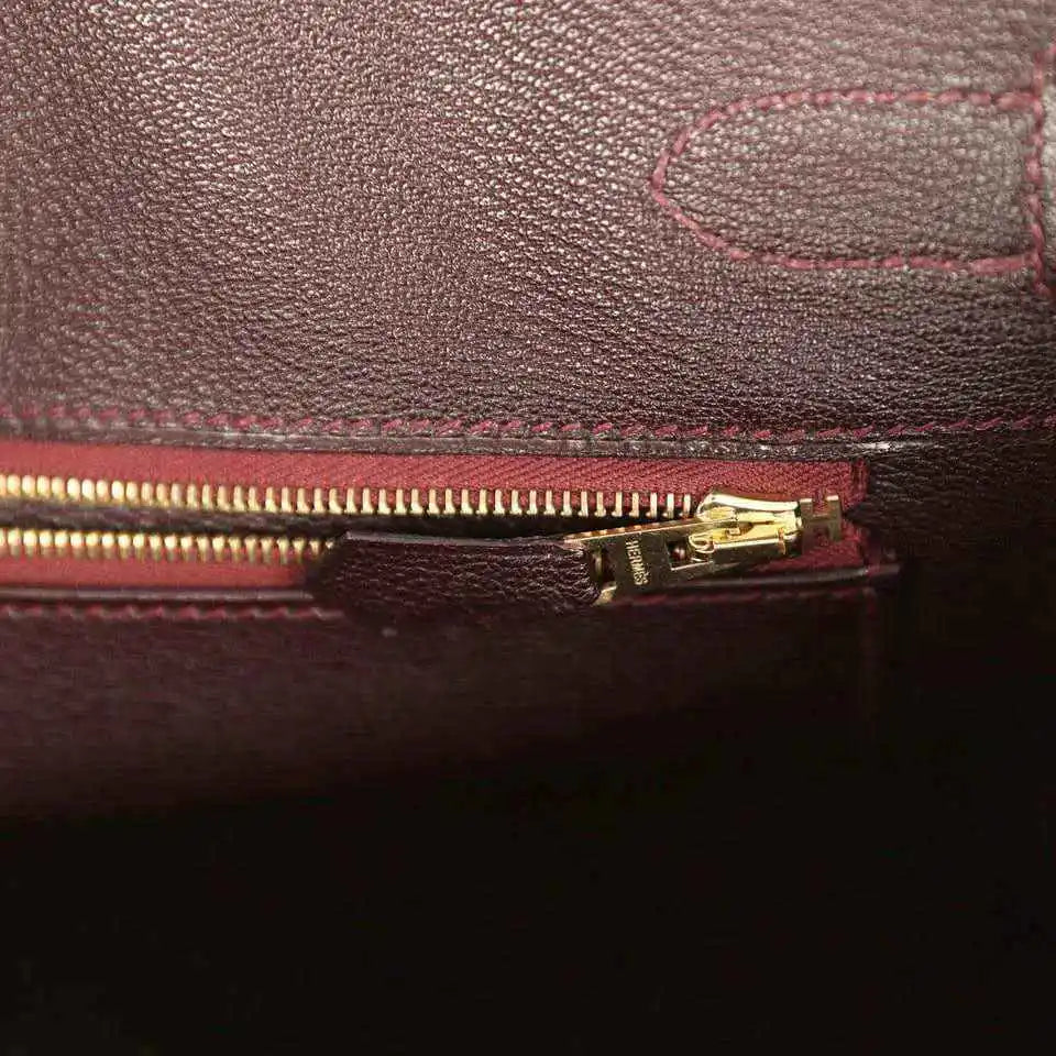 Hermes Birkin 30 bag interior pocket, gold-tone zipper and dark bordeaux leather trim