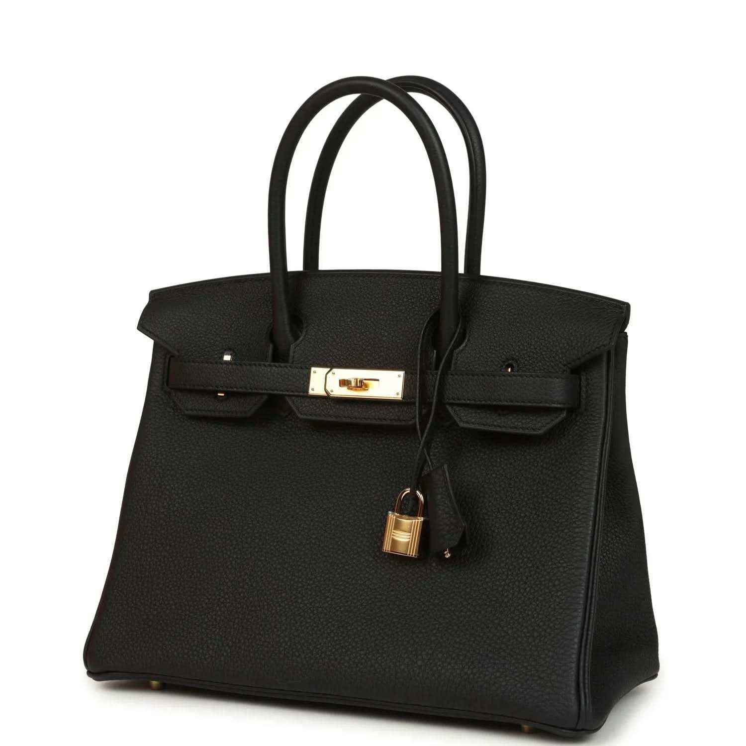 Black leather handbag with front flap, gold clasp, and dangling padlock