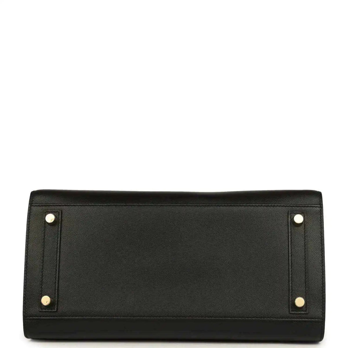 Black leather handbag with two gold corner studs on the back panel