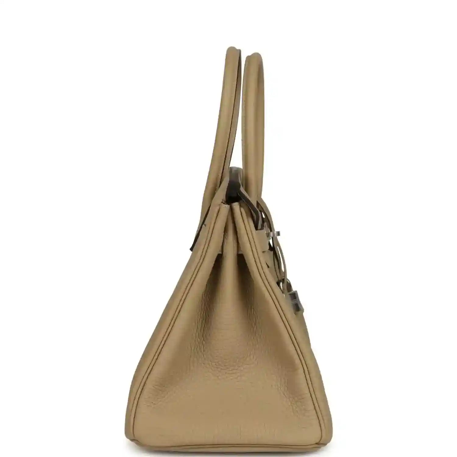 Tan leather handbag with two slim top handles and structured silhouette, side profile