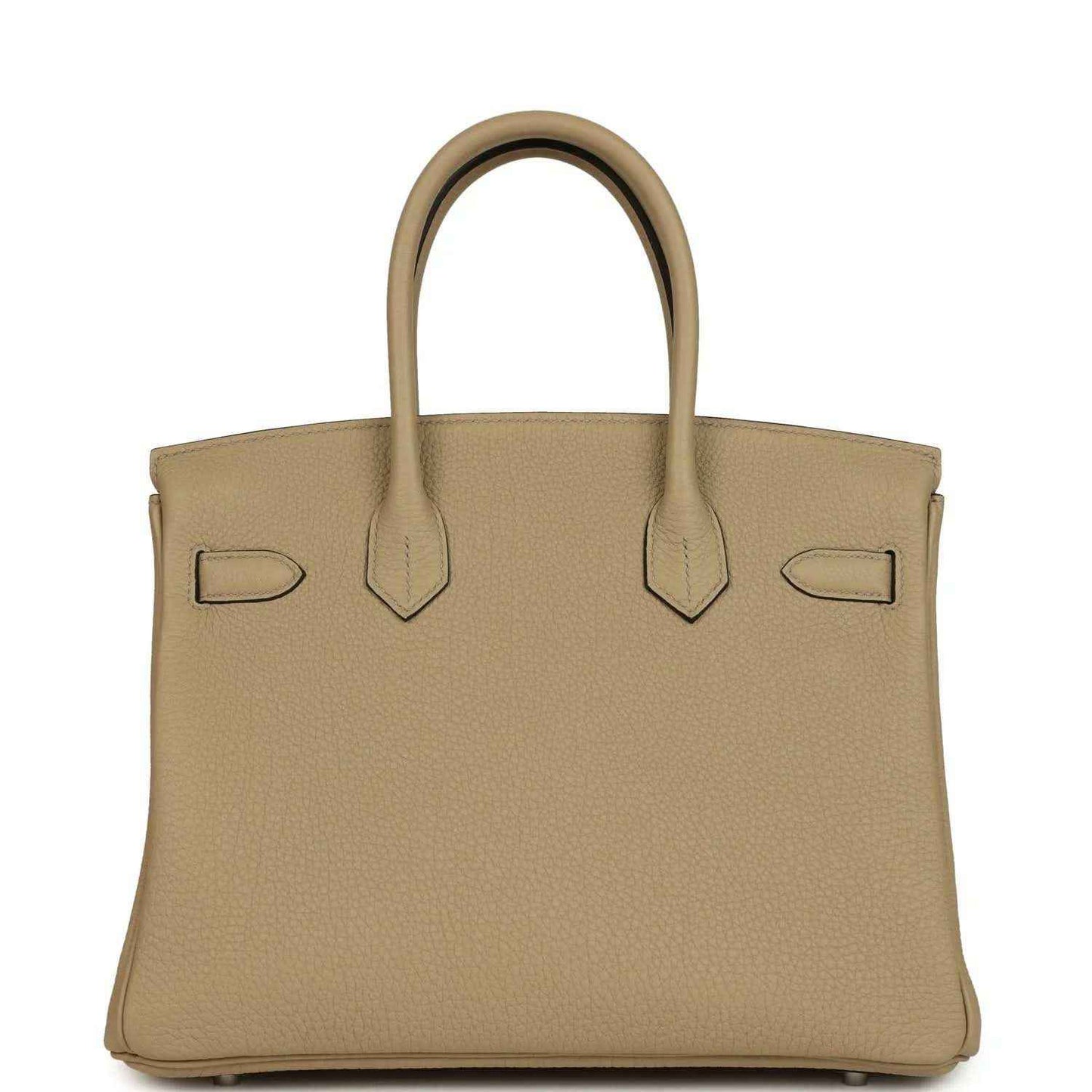 Tan leather handbag front view with flap, decorative straps, and polished lock bar