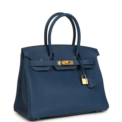 Hermes Birkin 30 blue Togo leather handbag with gold clasp and top handles