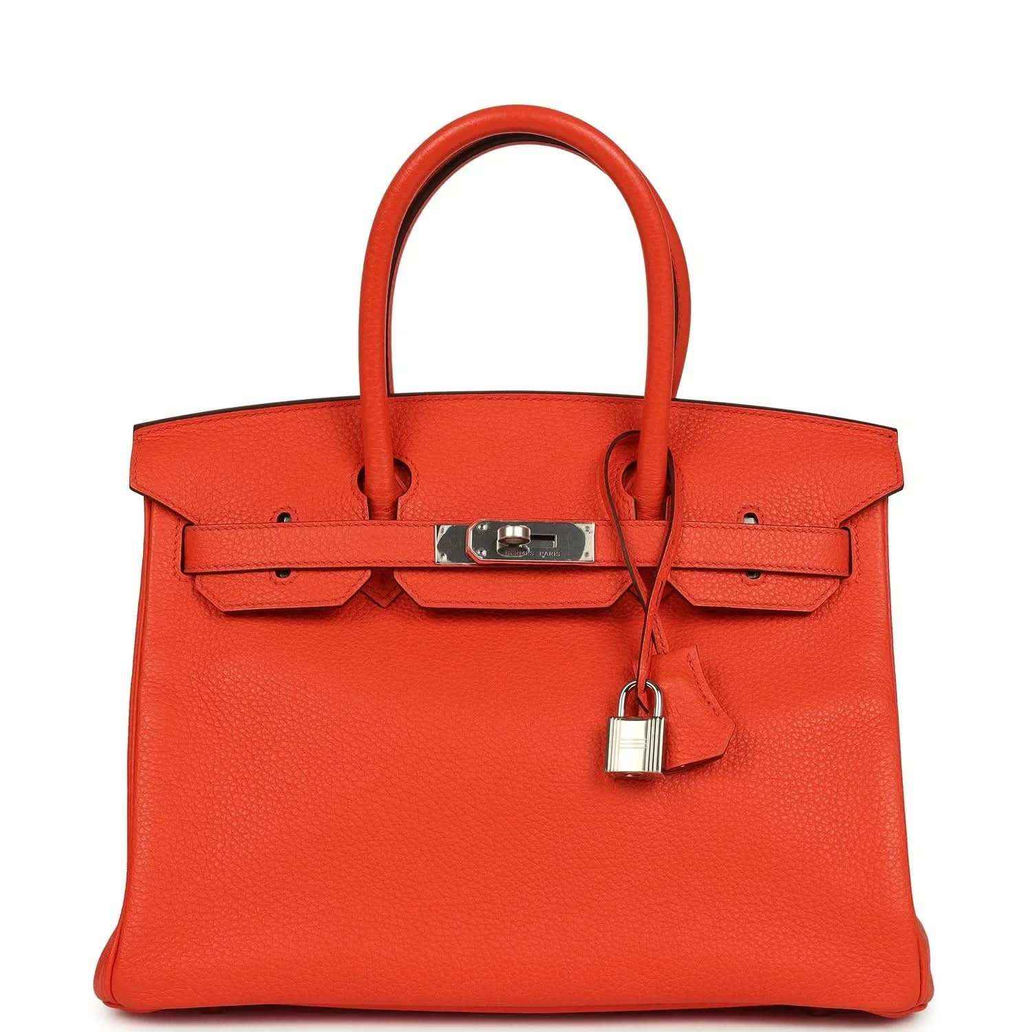 Orange Birkin handbag with textured Togo leather, top handles, and front belt lock
