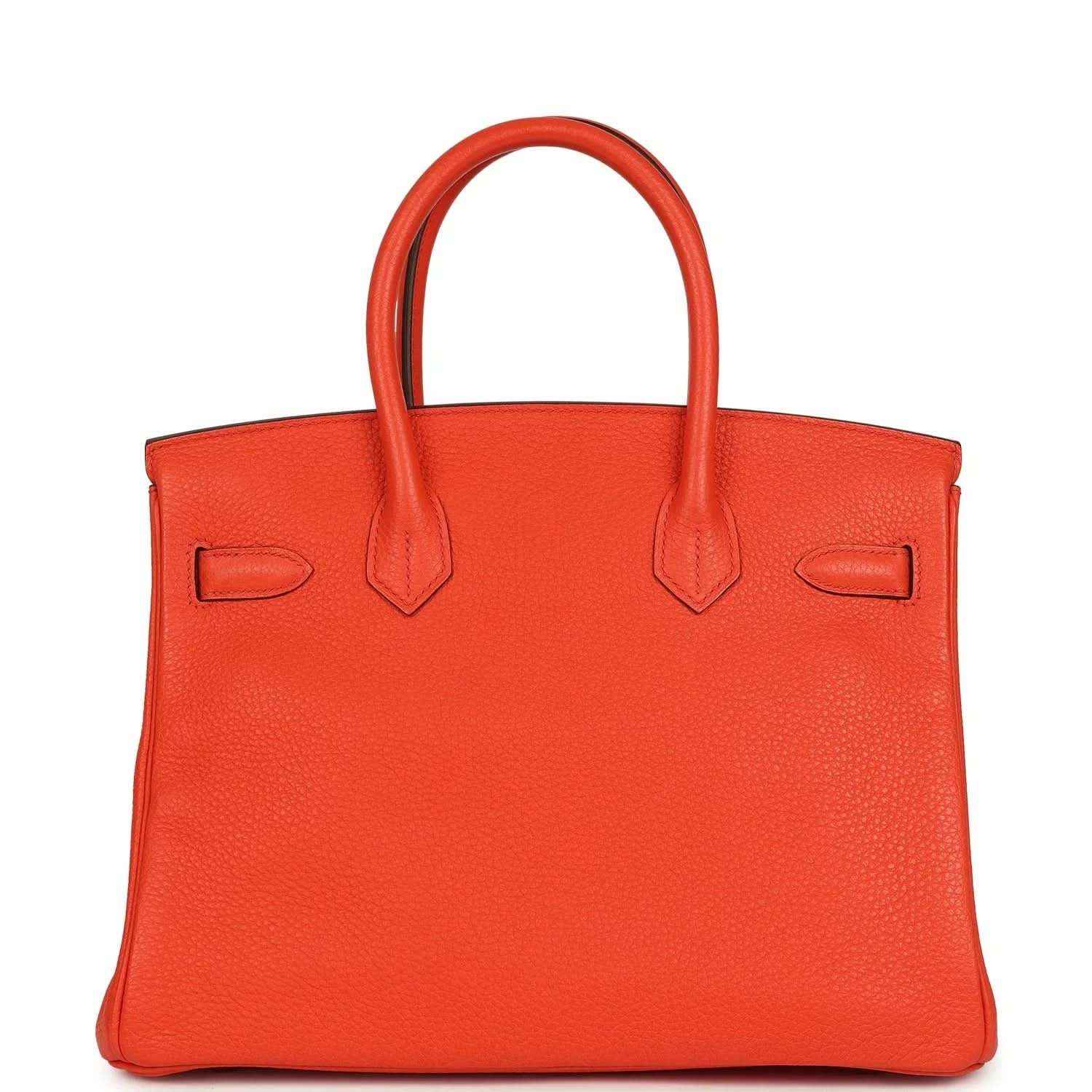 Orange Birkin handbag front view with textured leather and top handles, no lock visible