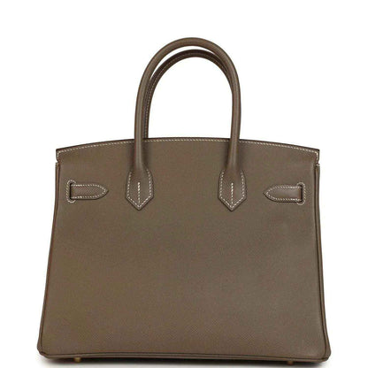 Etoupe leather Birkin 30 front view with flap detailing, top stitching, and gold hardware