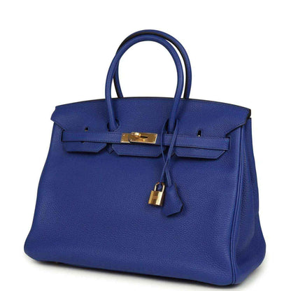 Hermes Birkin handbag in blue textured leather with gold lock and front strap