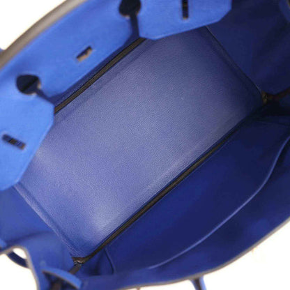 Hermes Birkin handbag interior in blue leather with latch opening visible