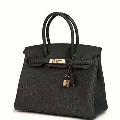 Dark green Togo leather handbag with front clasp and hanging padlock