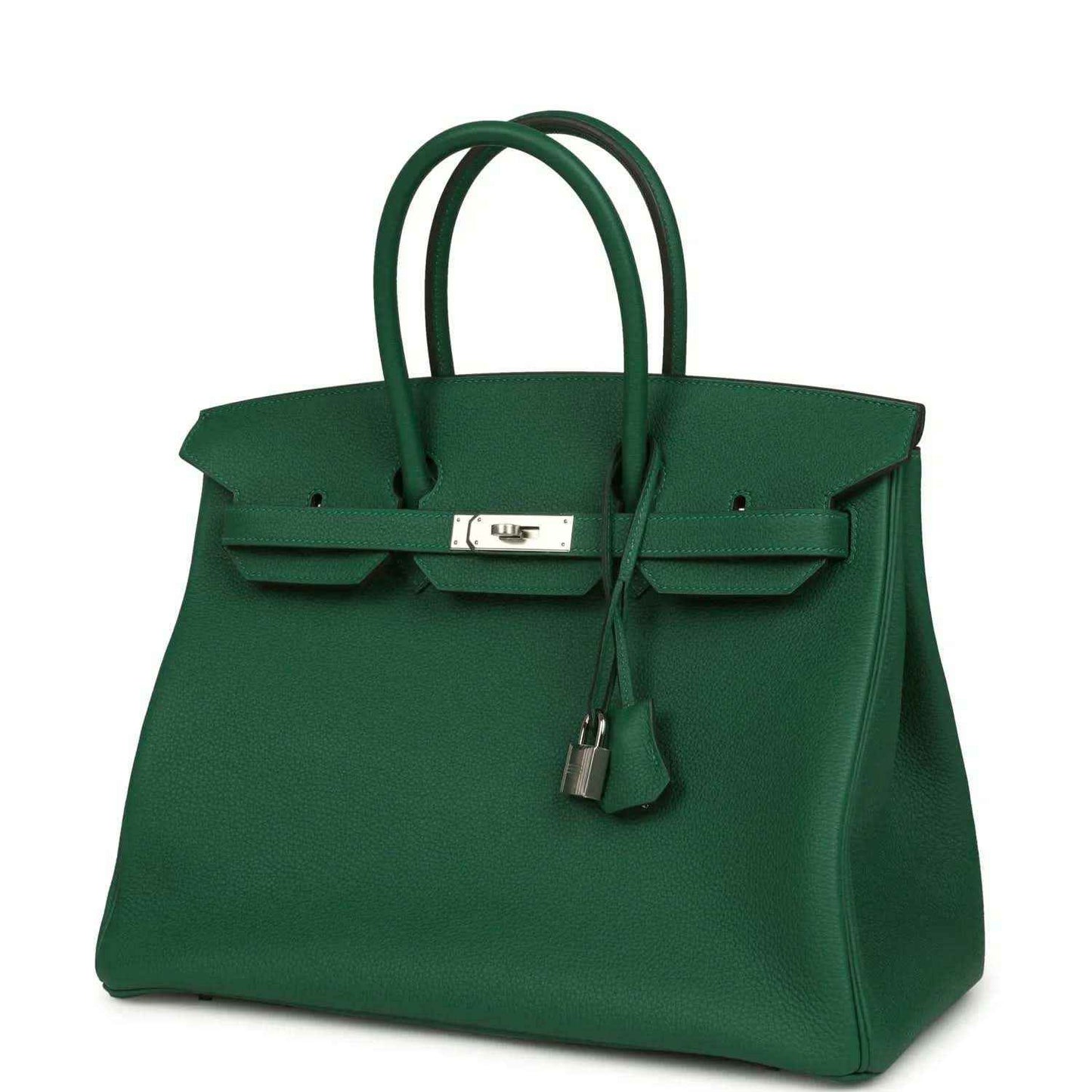 Green leather handbag with top handles, front flap, and silver-tone lock with charm