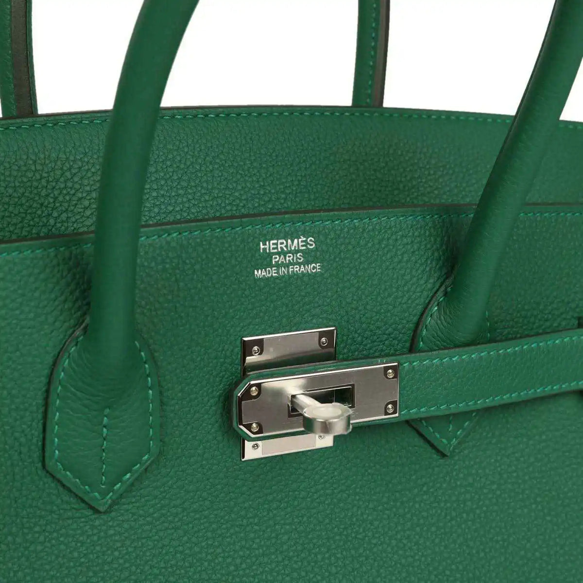 Green leather handbag with Hermes stamp and silver-tone front lock hardware