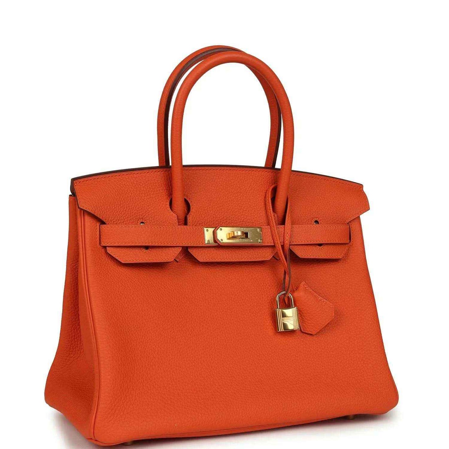 Orange leather handbag with gold-tone front clasp, top handles, and hanging lock charm.