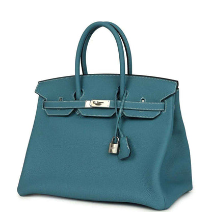 Turquoise Togo leather Birkin 35 handbag with front flap, palladium lock, and hanging charm