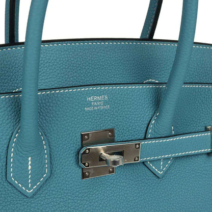 Hermes Paris lining stamp and palladium turn-lock clasp on Birkin handbag
