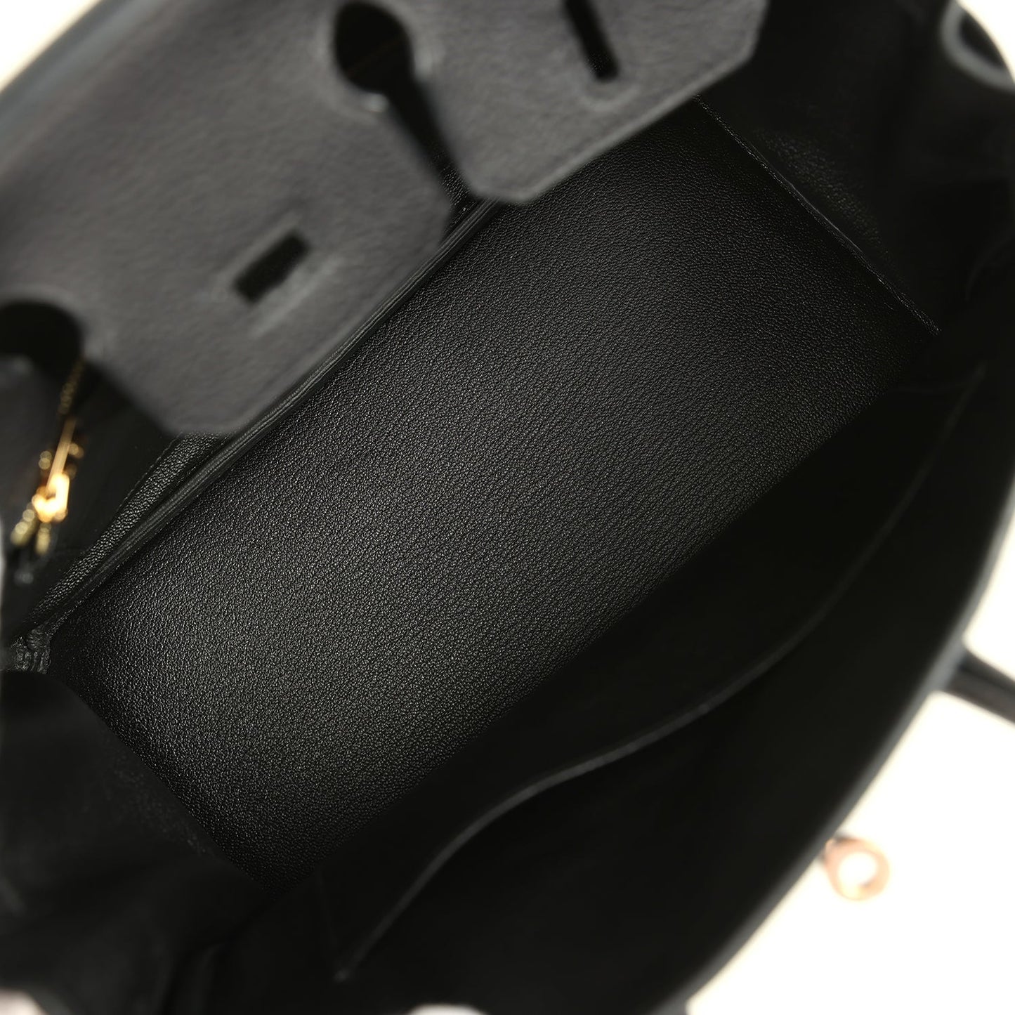 Black leather Birkin 25 handbag interior with dark fabric lining and side seam