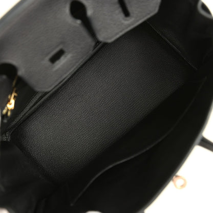 Black leather Birkin 25 handbag interior with dark fabric lining and side seam