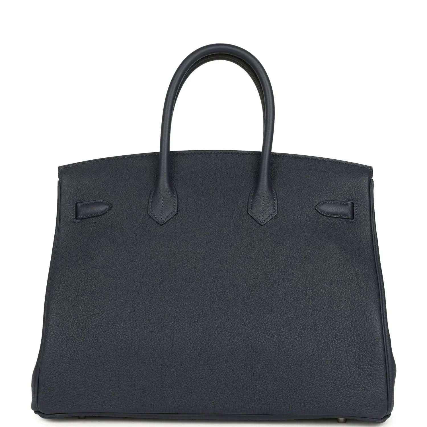 Navy leather handbag with top handles and front flap detail