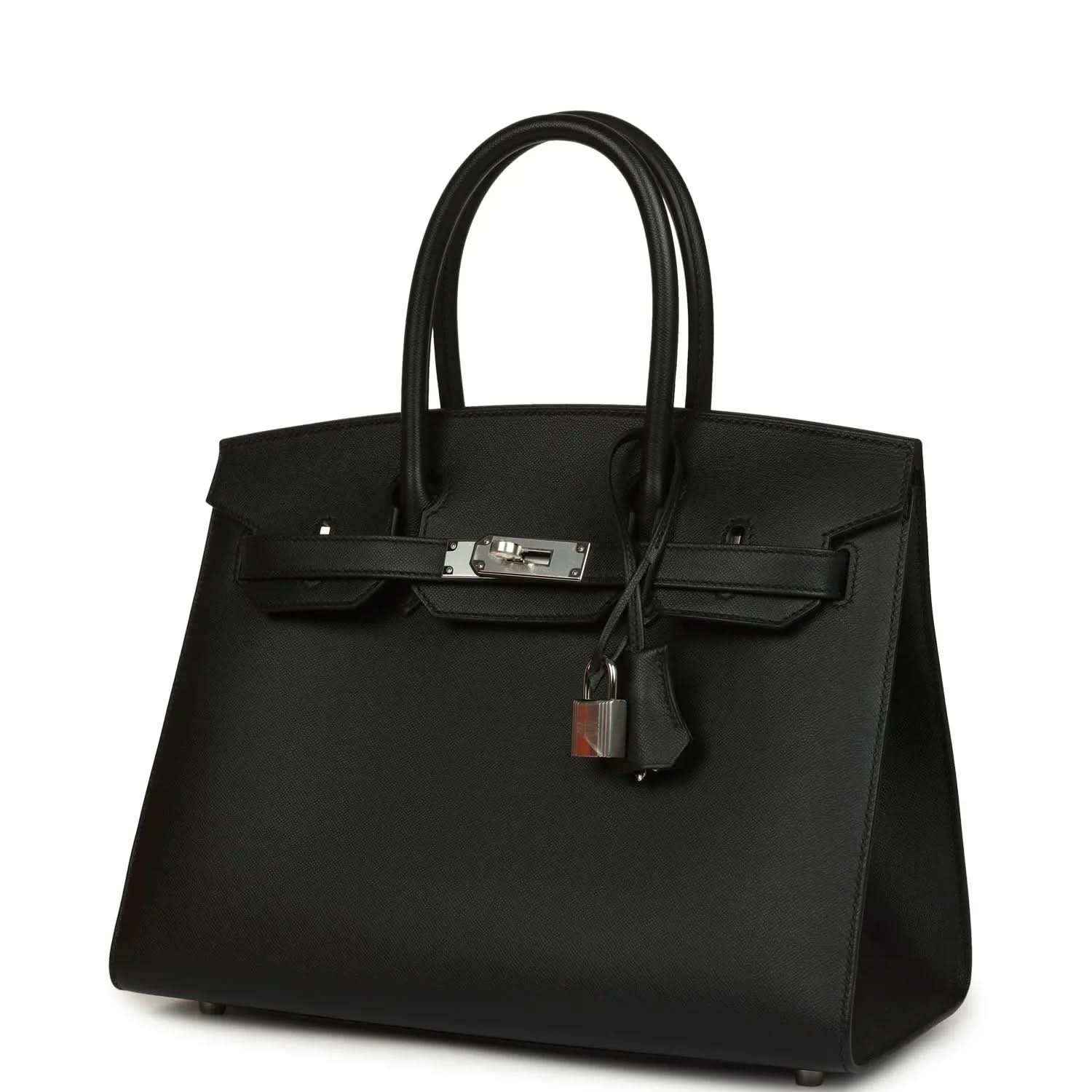 Black leather handbag with front clasp hardware and hanging lock charm