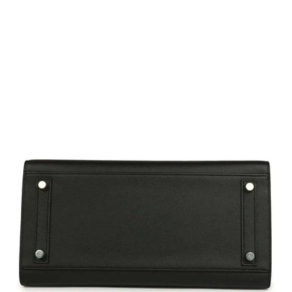 Black leather handbag back panel with two button snaps and stitched border