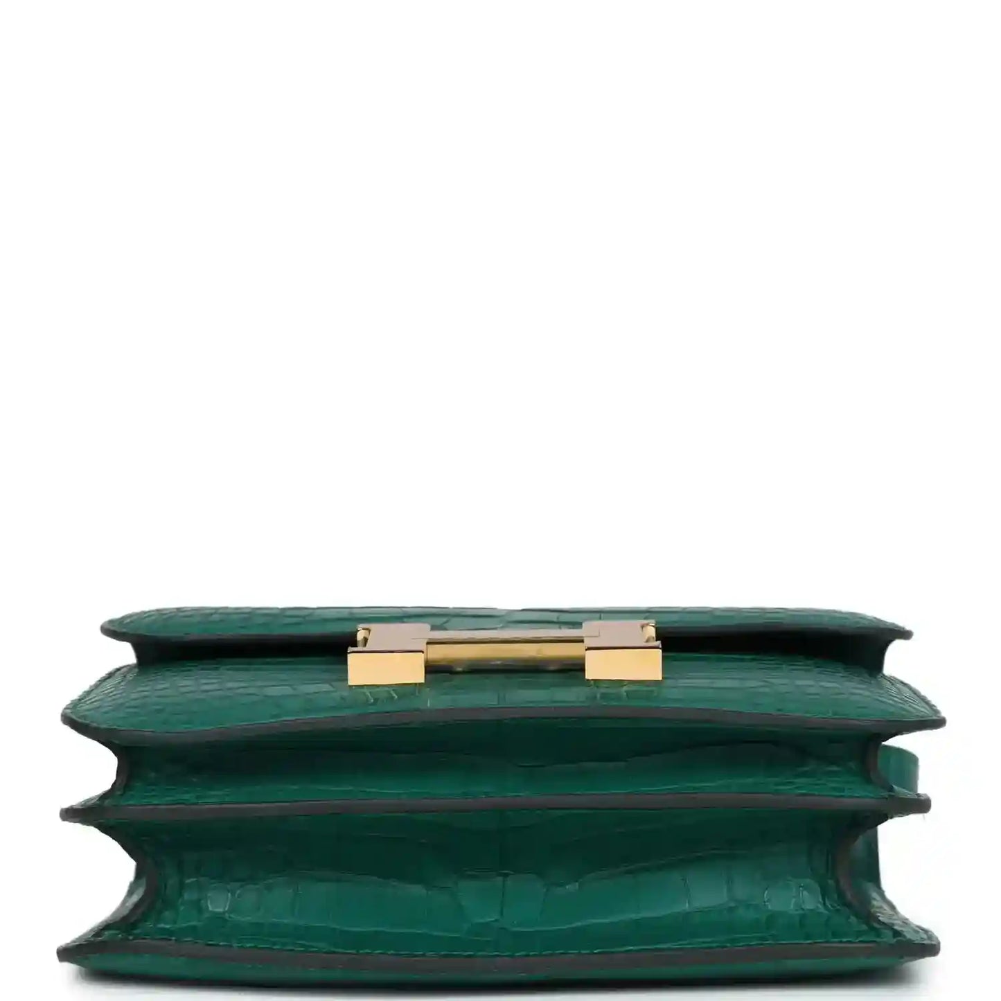 Green alligator-texture handbag top view with open flap and gold turn-lock hardware