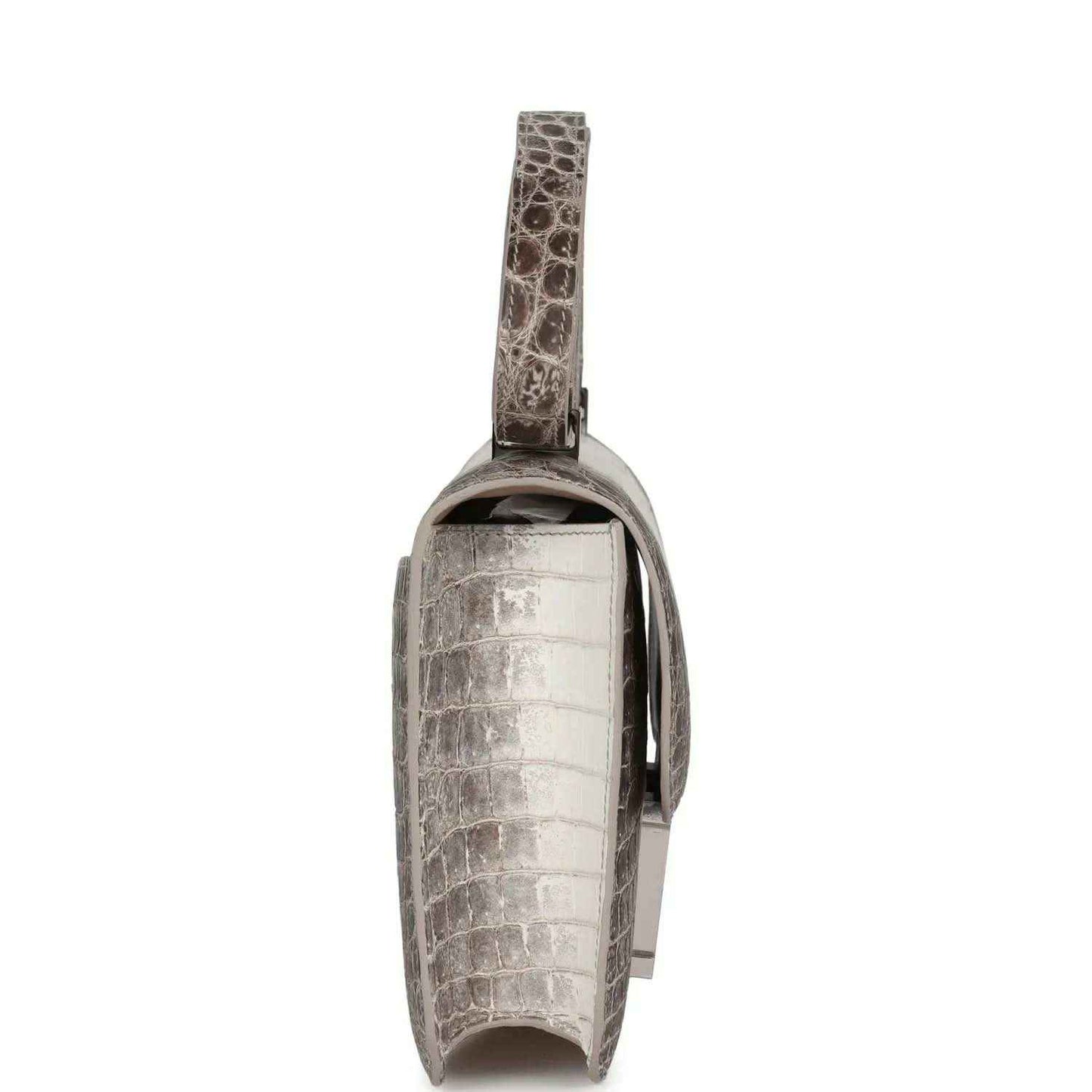 Side view of Constance-style croc-embossed leather bag with flap and turn-lock detail