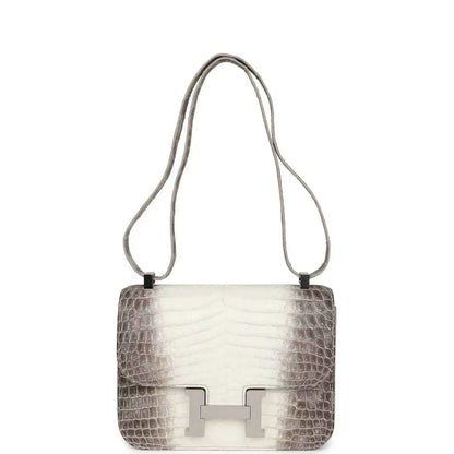 Constance-style mini bag with croc-embossed leather, top handles, and palladium clasp