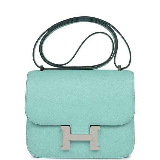 Aqua leather mini handbag with flap, H clasp, and palladium-tone hardware, top handle