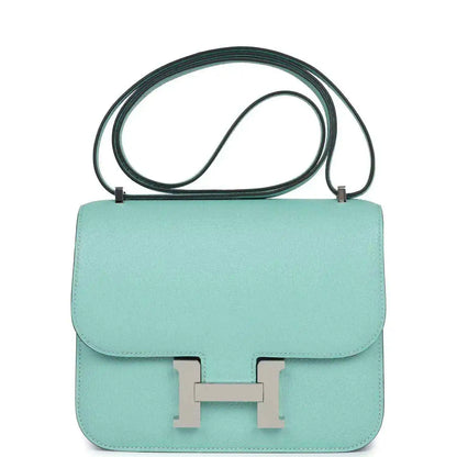 Aqua leather mini handbag with flap, H clasp, and palladium-tone hardware, top handle