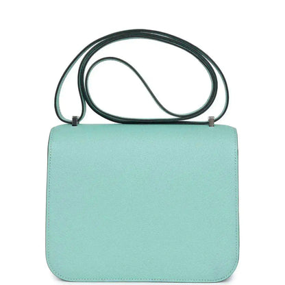 Aqua leather mini handbag with top handle and smooth front panel