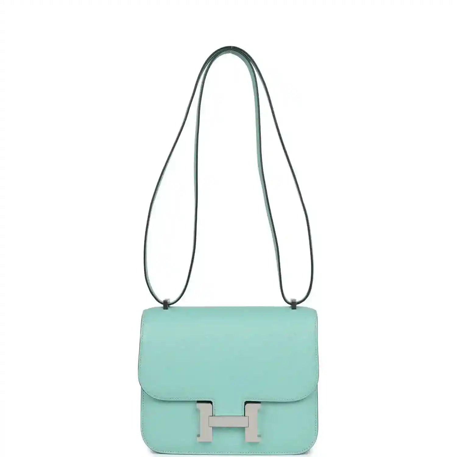 Aqua leather mini handbag with long shoulder strap and front flap