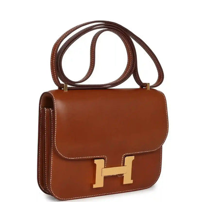 Brown leather Constance-style handbag with front flap and gold H clasp