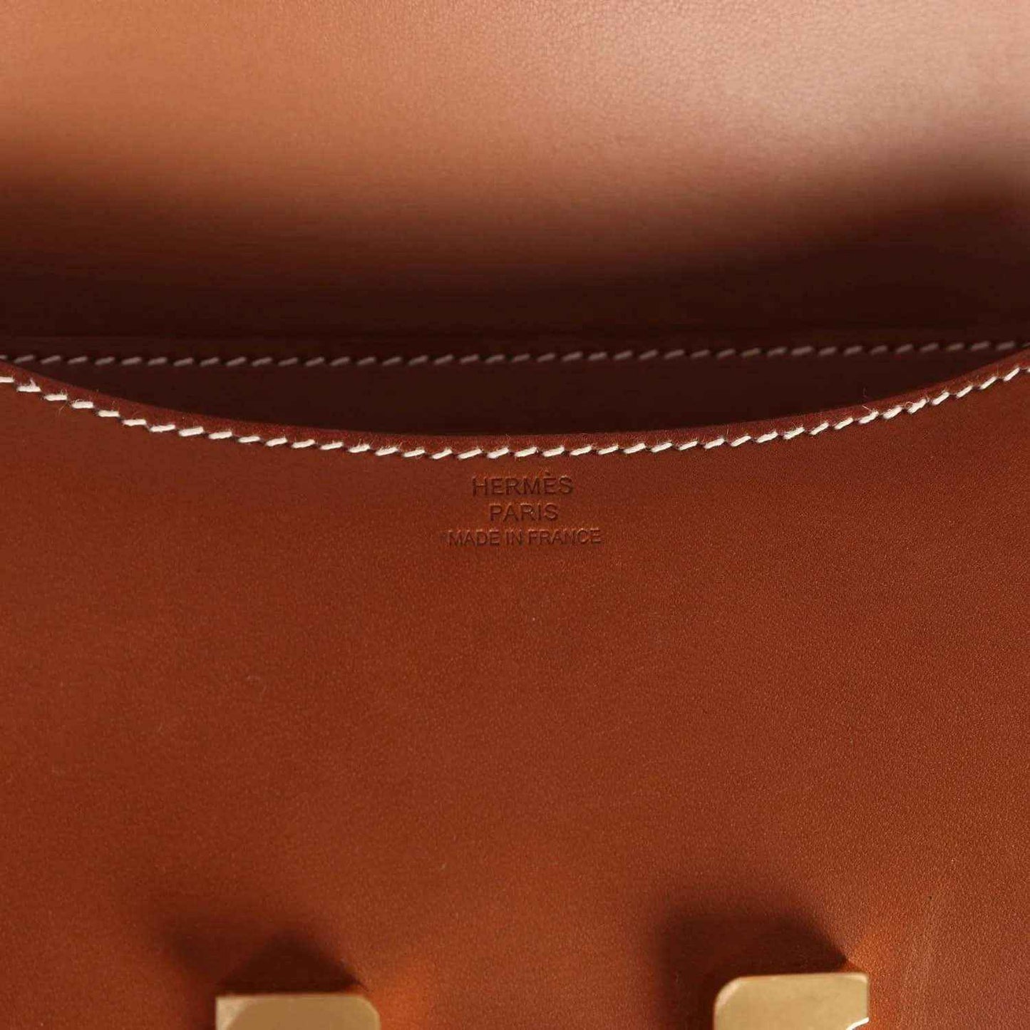 Brown leather bag with Hermes stamp and Made in France text on lining