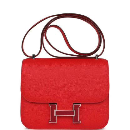 Red leather flap handbag with front H clasp and double straps