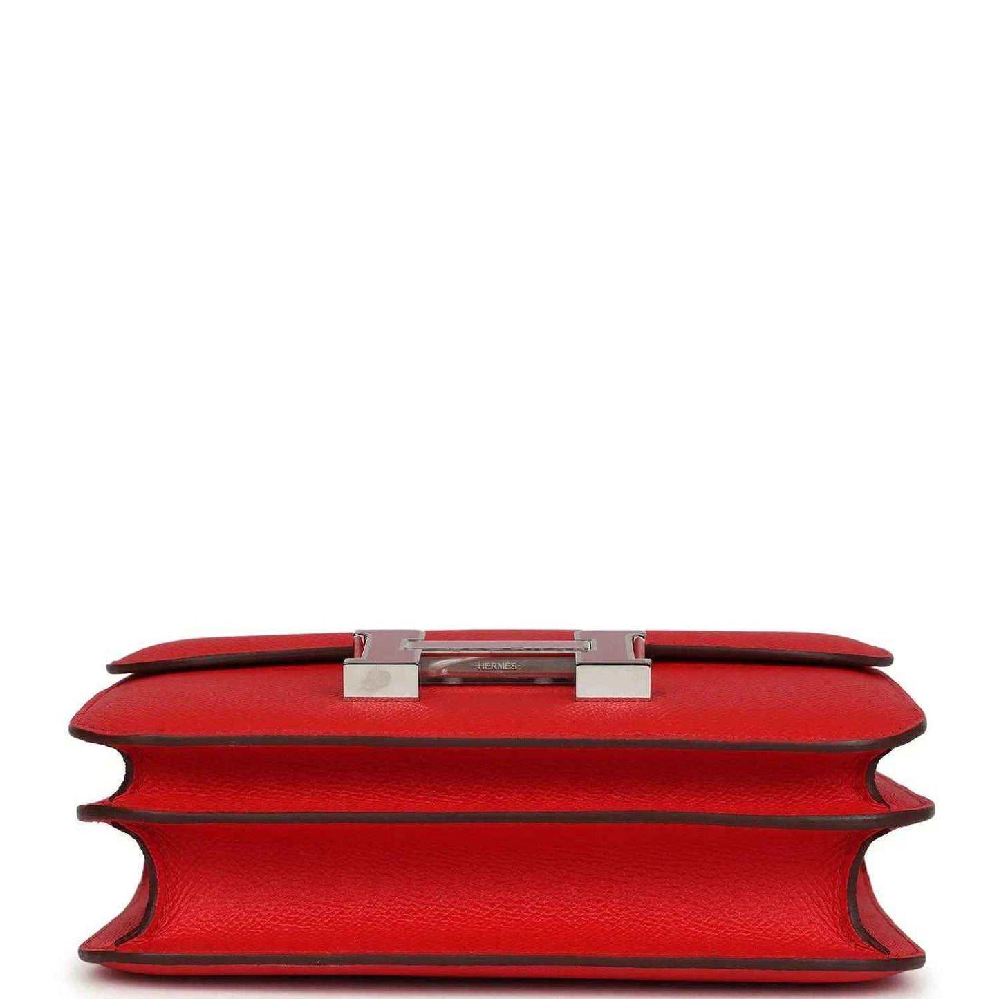 Red leather mini handbag top edge with metal H clasp and lining