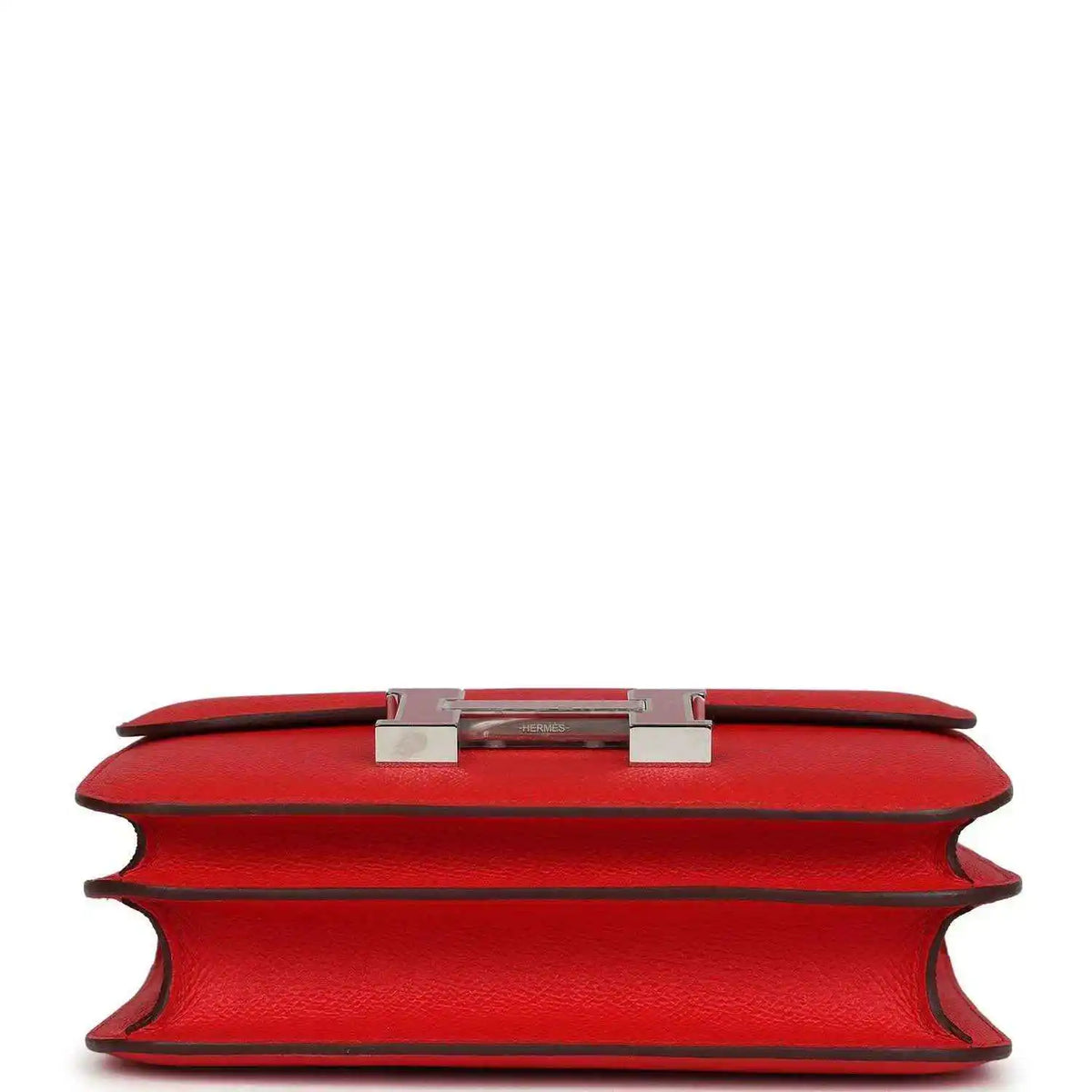 Red leather mini handbag top edge with metal H clasp and lining