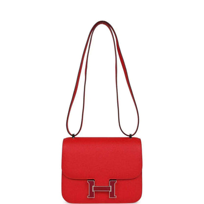 Red leather crossbody handbag with flap and front H clasp