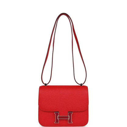 Red leather crossbody handbag with flap and front H clasp