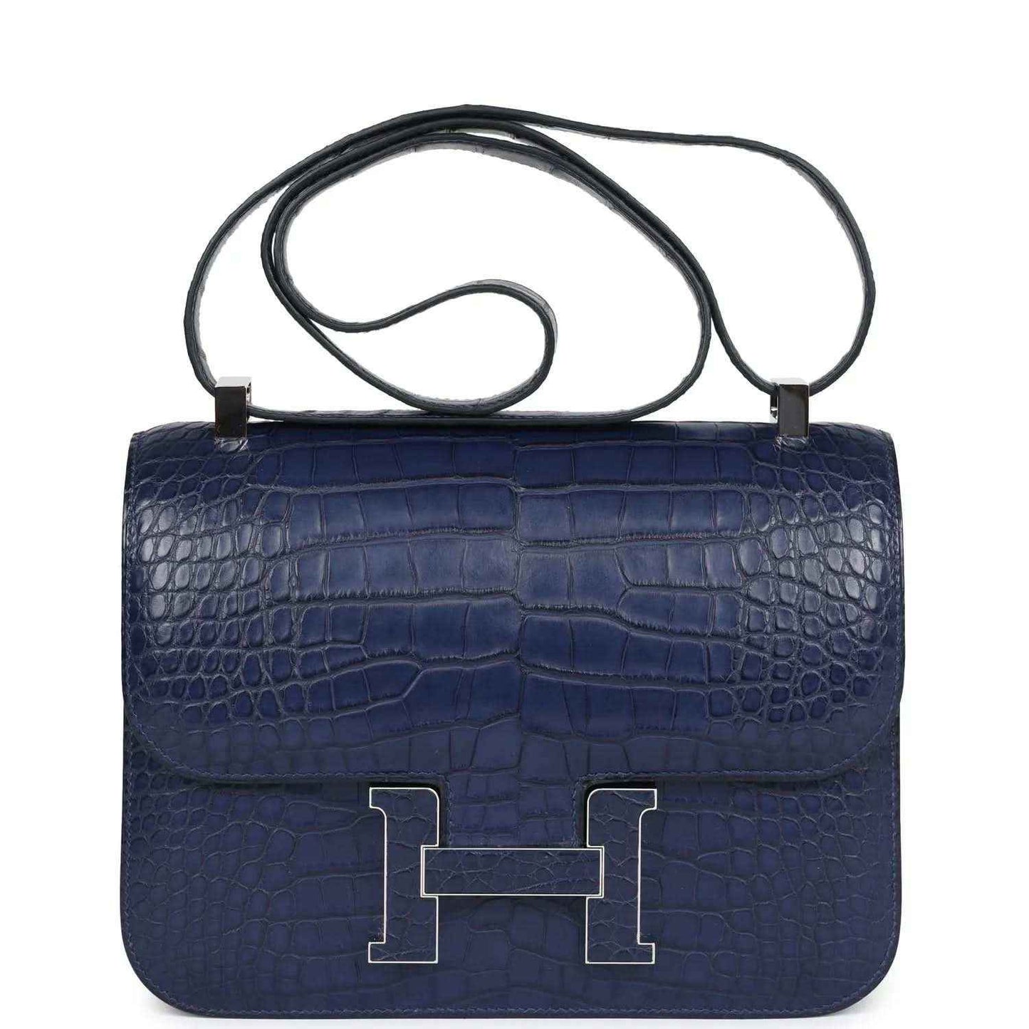 Blue alligator-effect handbag with top handle, front flap, and palladium H clasp
