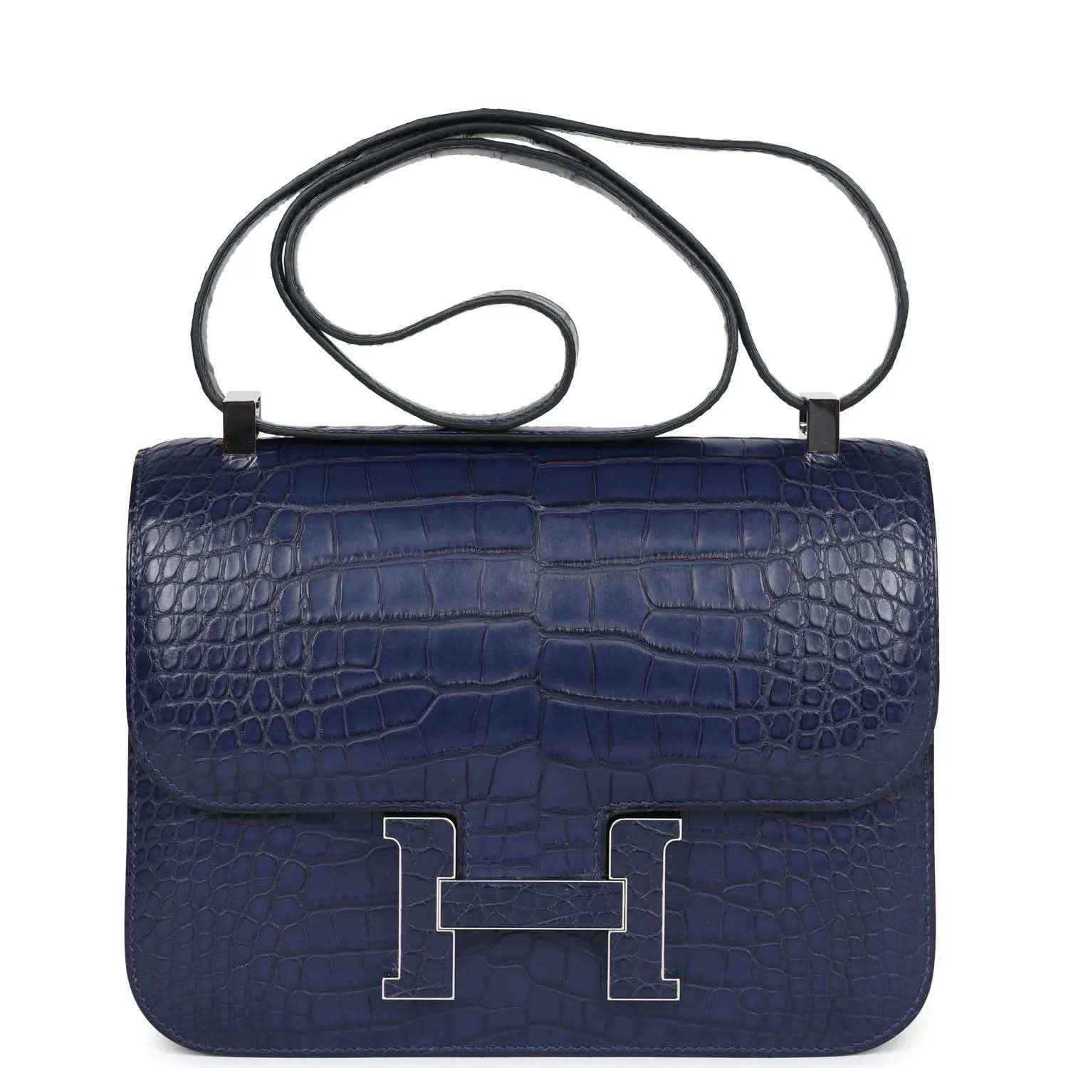 Blue alligator-effect handbag with top handle, front flap, and palladium H clasp