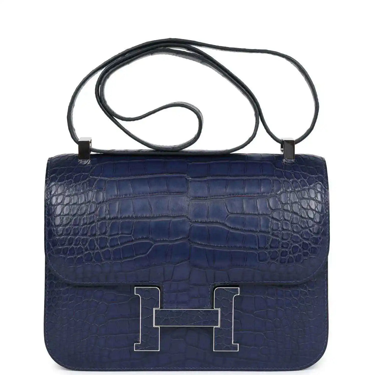 Blue alligator-effect handbag with top handle, front flap, and palladium H clasp