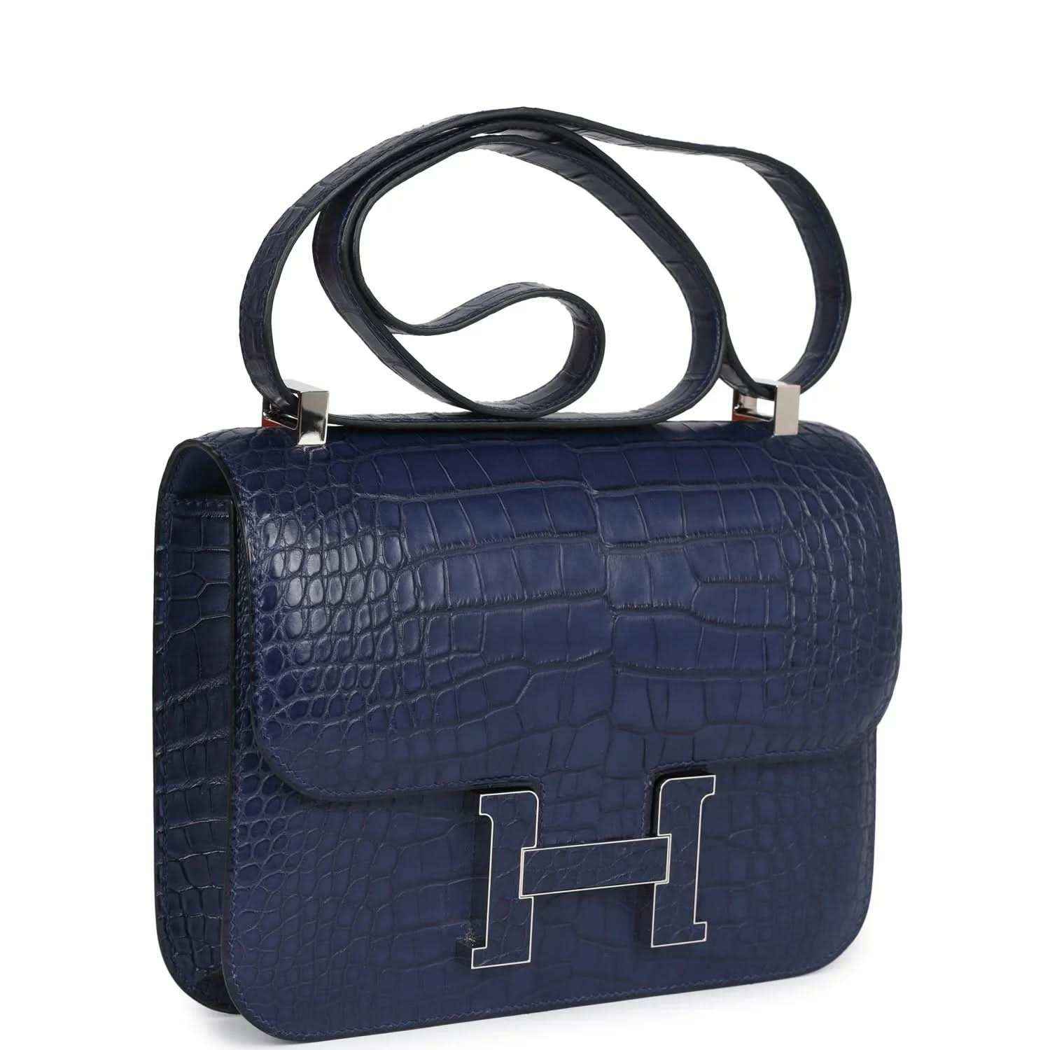 Blue alligator-effect handbag with shoulder strap, front flap, and palladium H clasp